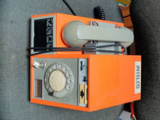 Retro vintage oranje telefoon draaischijf munttelefoon
