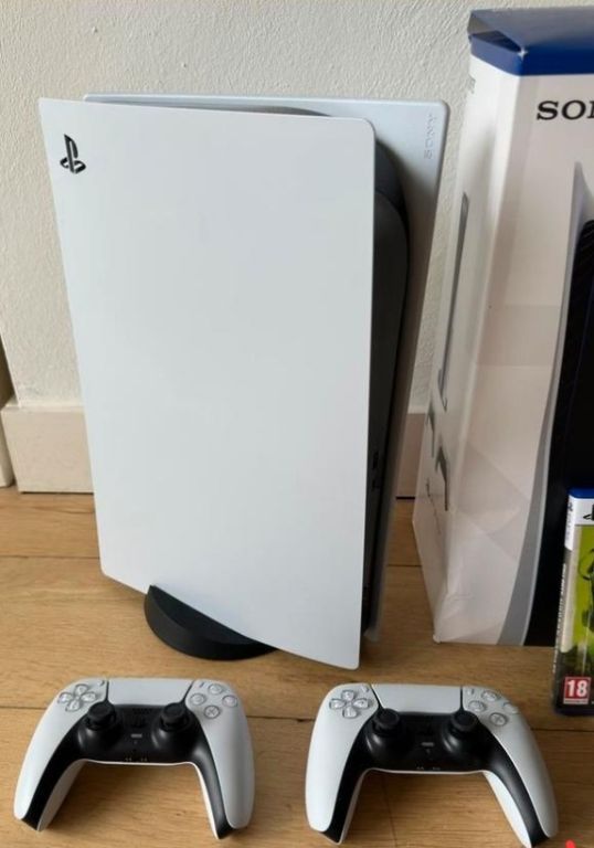 Ps5 disc versie 1tb met 2 dual sense controllers en games