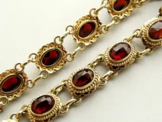 Armbanden Gouden armband 21cm lengte met granaat van 8mm