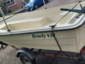 Sloepen sloep met trailer motor biminitop