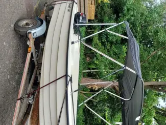 Sloepen sloep met trailer motor biminitop