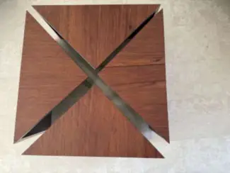 Tafels | Salontafels Salontafel bubinga hout met RVS poot 4 driekhoeken