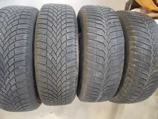 Fiat Punto winterbanden op velg. 185 x 65 x R15